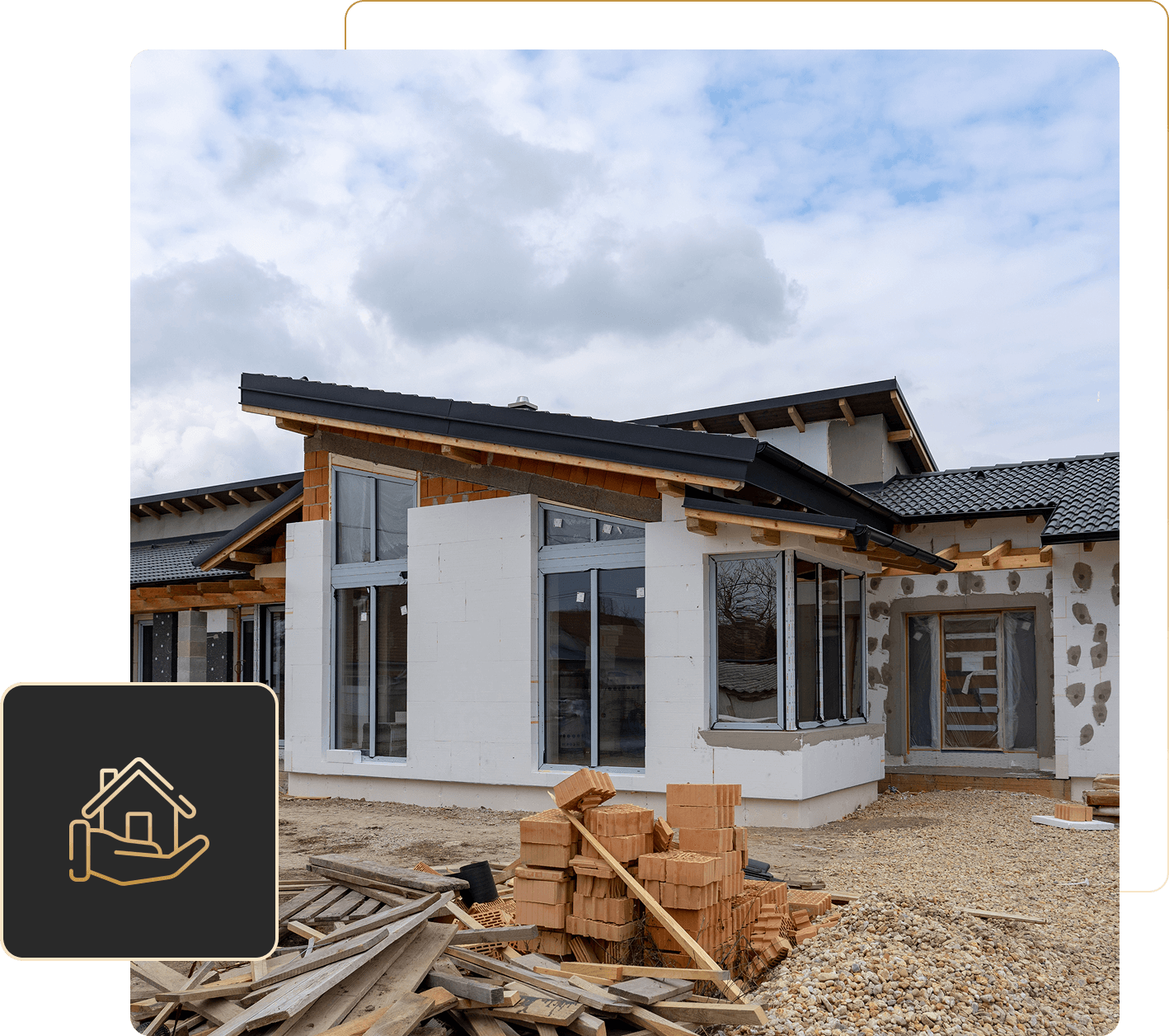 Modern house under construction with bricks outside.